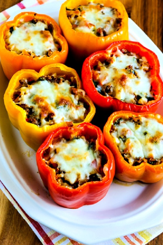 Cauliflower Rice Southwestern Stuffed Peppers close-up photo of six peppers on serving plate
