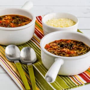 Square image for Slow Cooker Sausage Stew shown in two serving bowls.