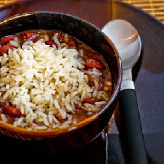 Slow Cooker Red Beans and Rice thumbnail image with spoon