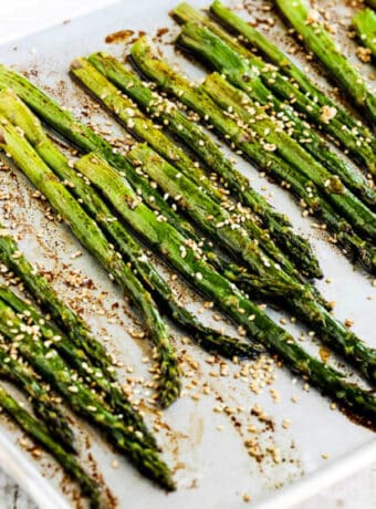 Square image of Asparagus with Soy-Sesame Glaze shown on roasting pan.