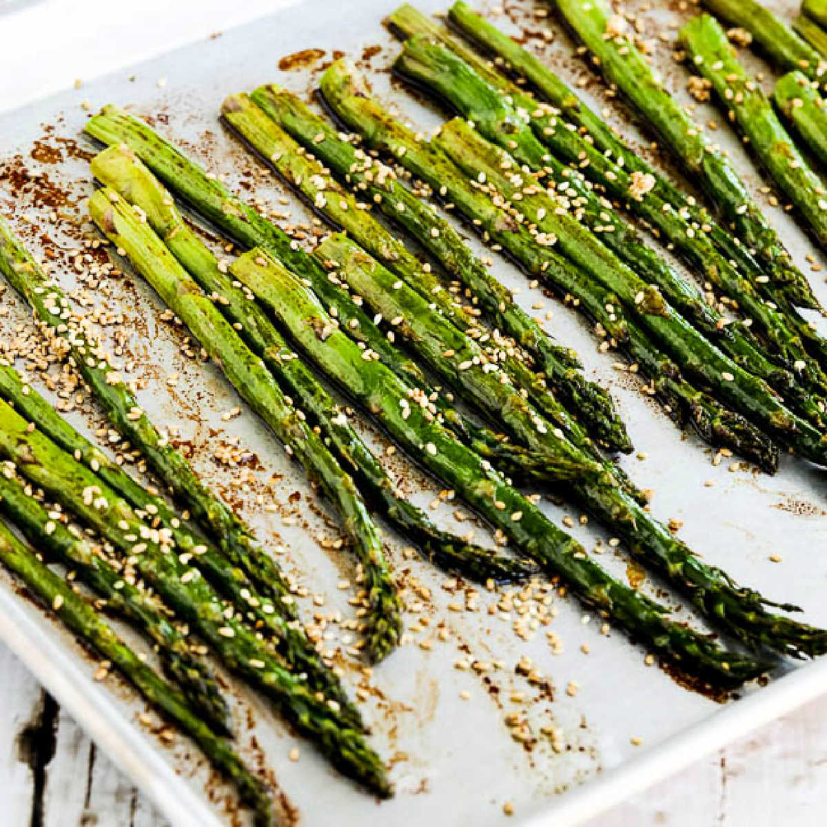 Square image of Asparagus with Soy-Sesame Glaze shown on roasting pan.