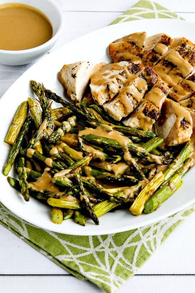 Low-Carb Chicken and Roasted Asparagus with Tahini Sauce found on KalynsKitchen.com.