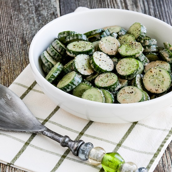 Square Image of Cucumber Salad with Balsamic Dressing in a Serving Bowl