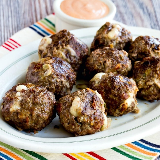 Low-Carb Grilled Bacon Cheeseburger Meatballs thumbnail image of cooked meatballs on serving plate
