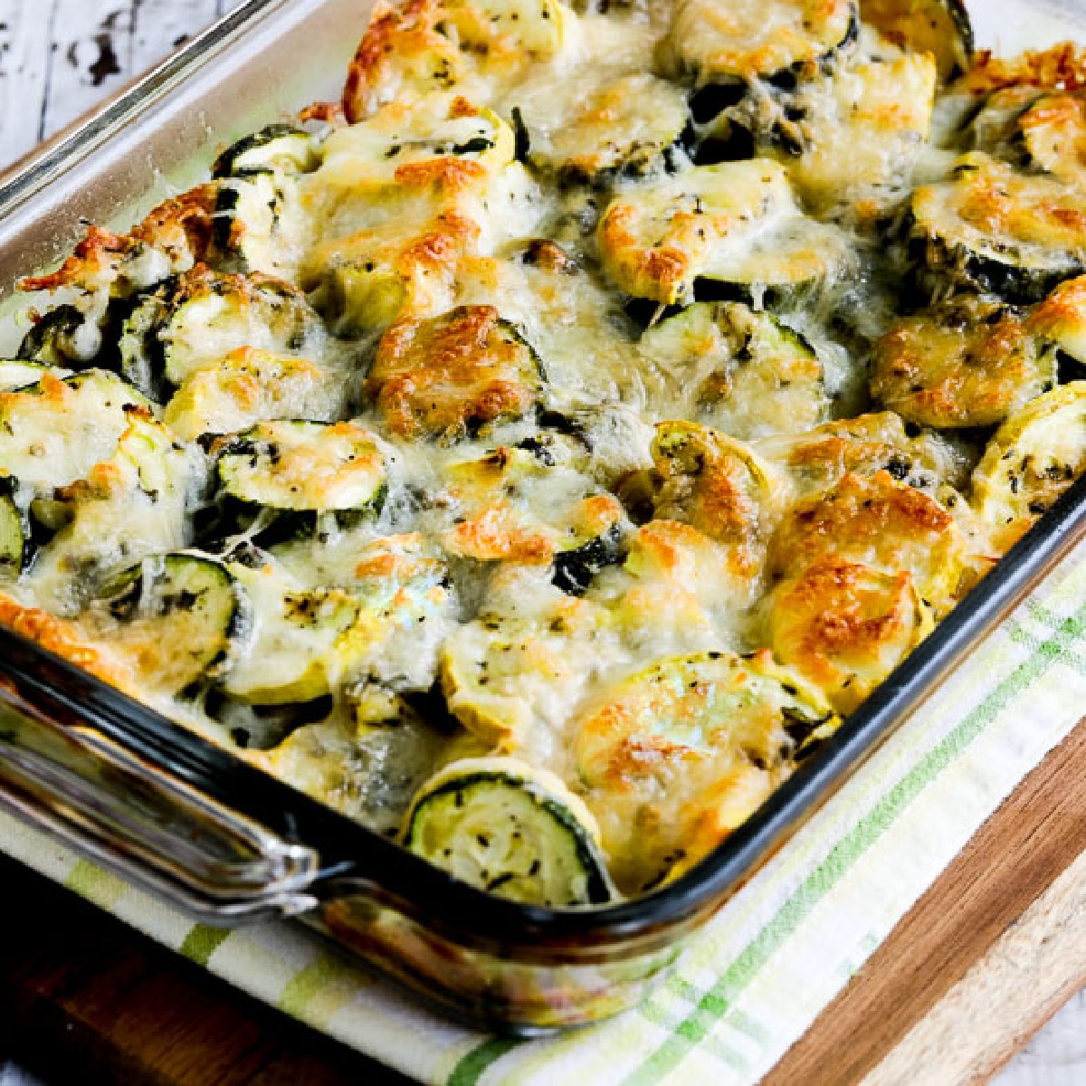 square image of Easy Cheesy Zucchini Bake in baking dish