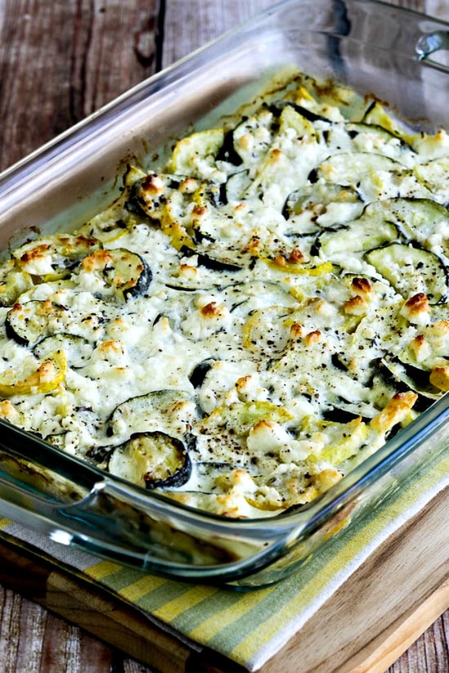 Bake zucchini with feta and finished casserole with thyme in a baking dish