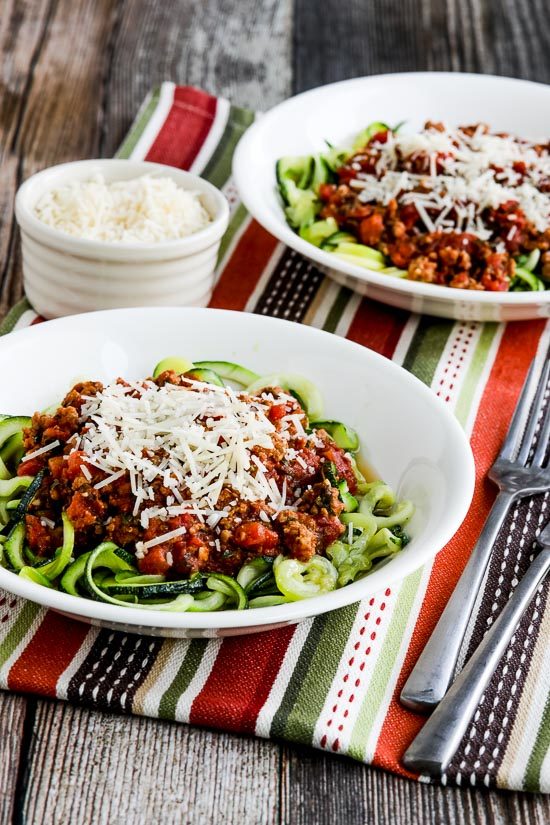 Instant Pot Pasta Sauce with Sausage, Tomatoes, and Herbs two dishes with zucchini noodles and sauce