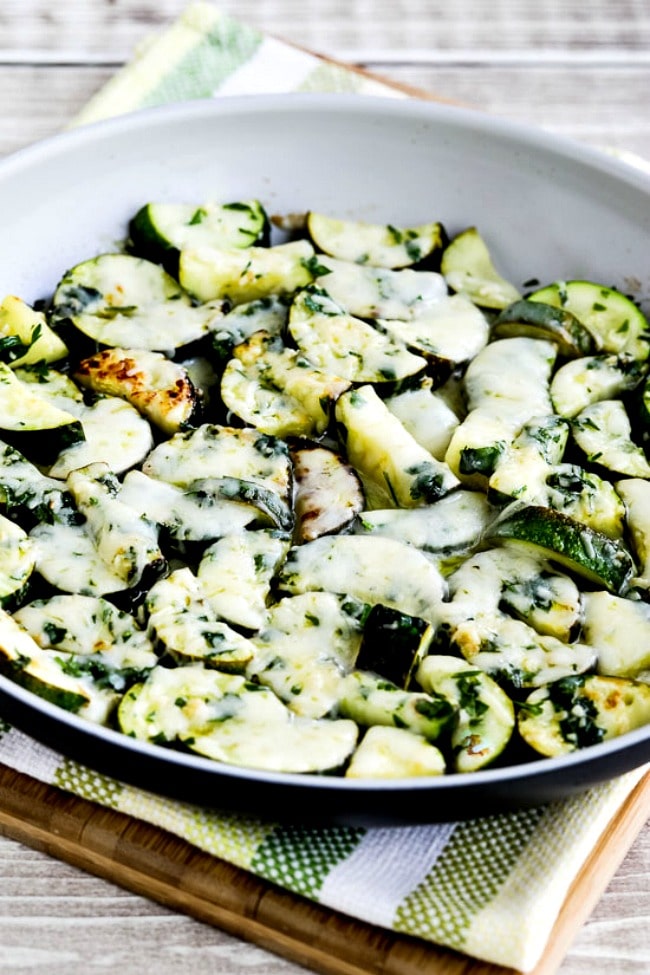 Cheesy Zucchini with Garlic and Parsley close-up photo