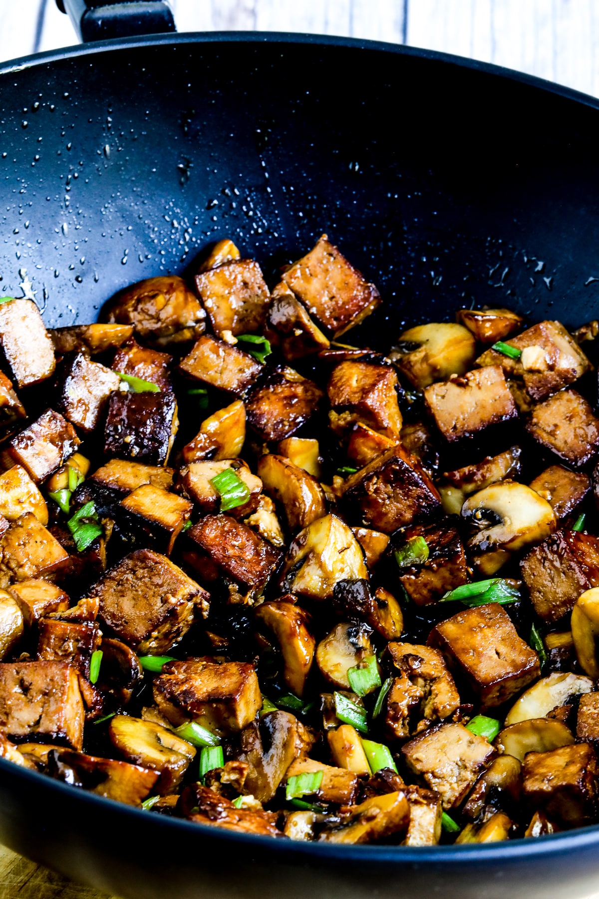 Tofu Mushroom Stir Fry shown in wok.