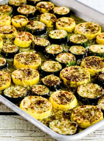 square image of Summer Squash with Pesto and Parmesan on baking sheet