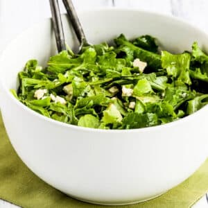Kale and Arugula Salad shown in serving bowl.