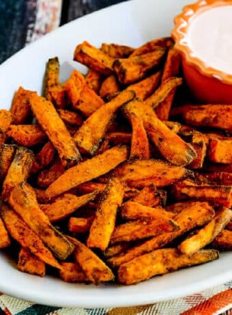 Square image for Air Fryer Sweet Potato Fries on serving plate with Sriracha Aioli Dipping Sauce.