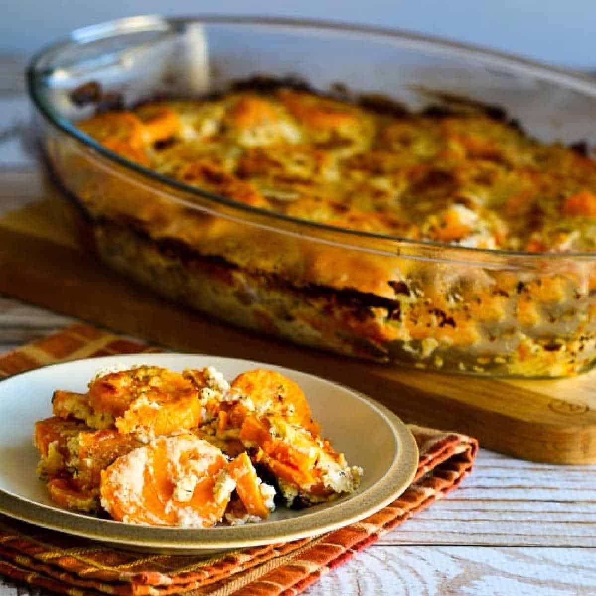 Sweet Potato Gratin with one serving on small plate and baking dish in background