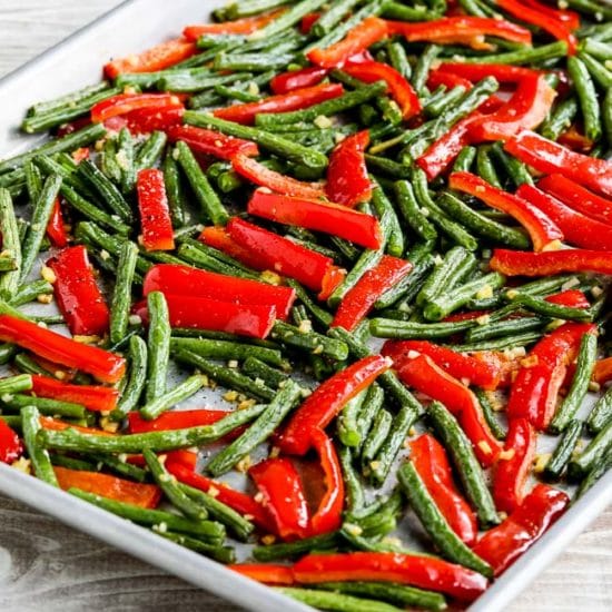 Roasted green beans and red peppers with garlic and ginger