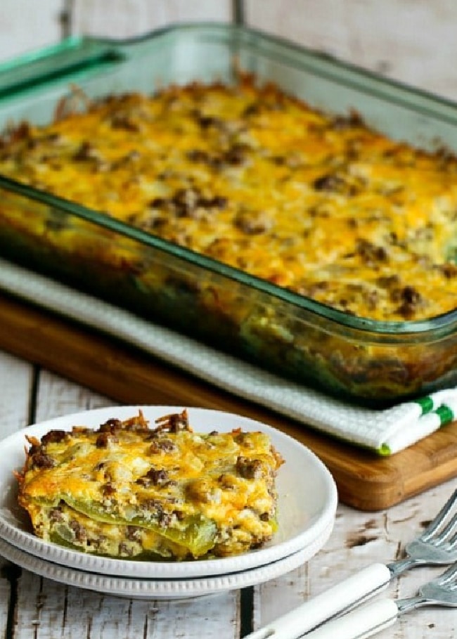 cropped image of Beefy Cheesy Green Chile Bake shown on plate and in baking dish