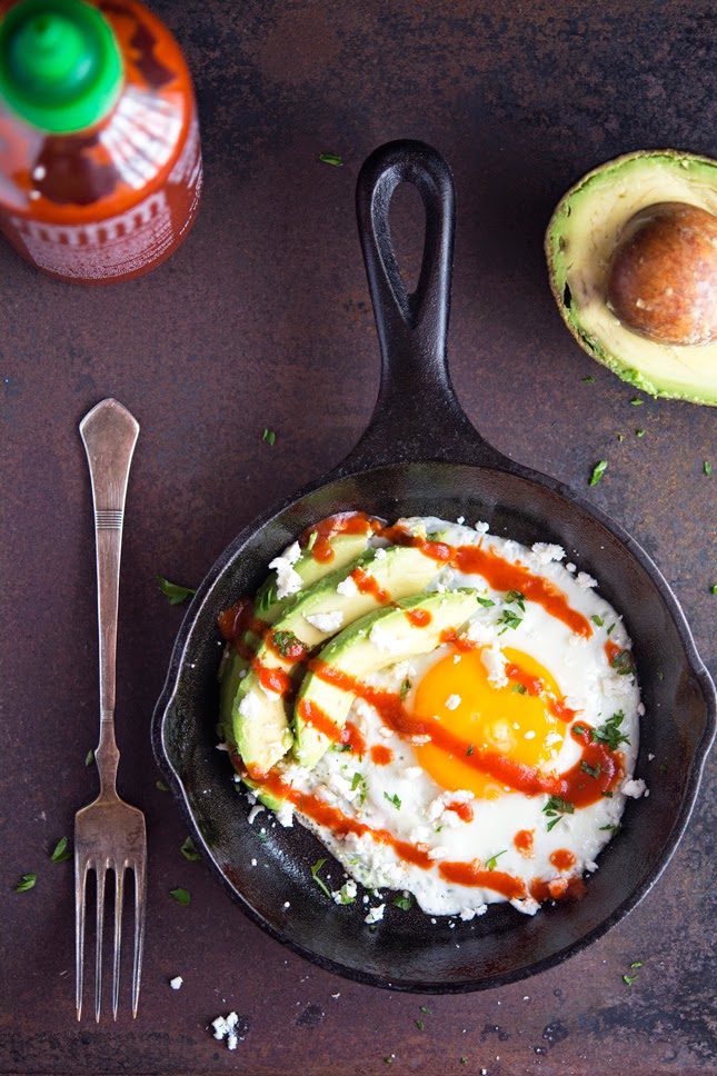 Sunnyside Up Egg with Avocado, Sriracha, and Crumbled Feta from The Iron You
