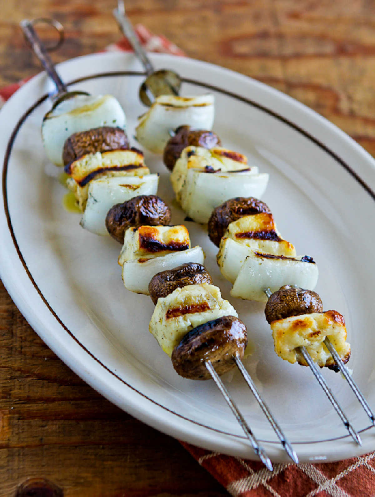 Grilled Halloumi Cheese with Mushrooms on serving platter