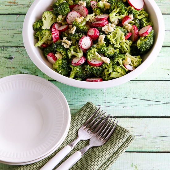 thumbnail image of Easy Broccoli Radish Salad in bowl with plates and forks