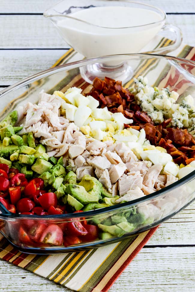 Lettuce-Free Keto Cobb Salad in serving dish with dressing