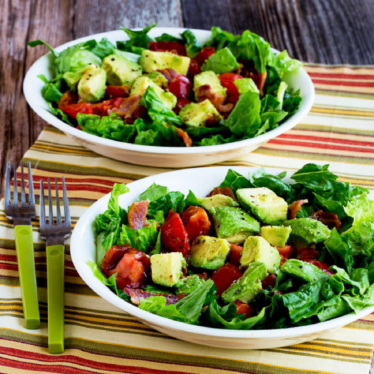 Bacon Lettuce Tomato Avocado Salad in two serving bowls.