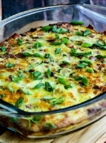 Square image of Pork Lover's Breakfast Casserole in baking dish.