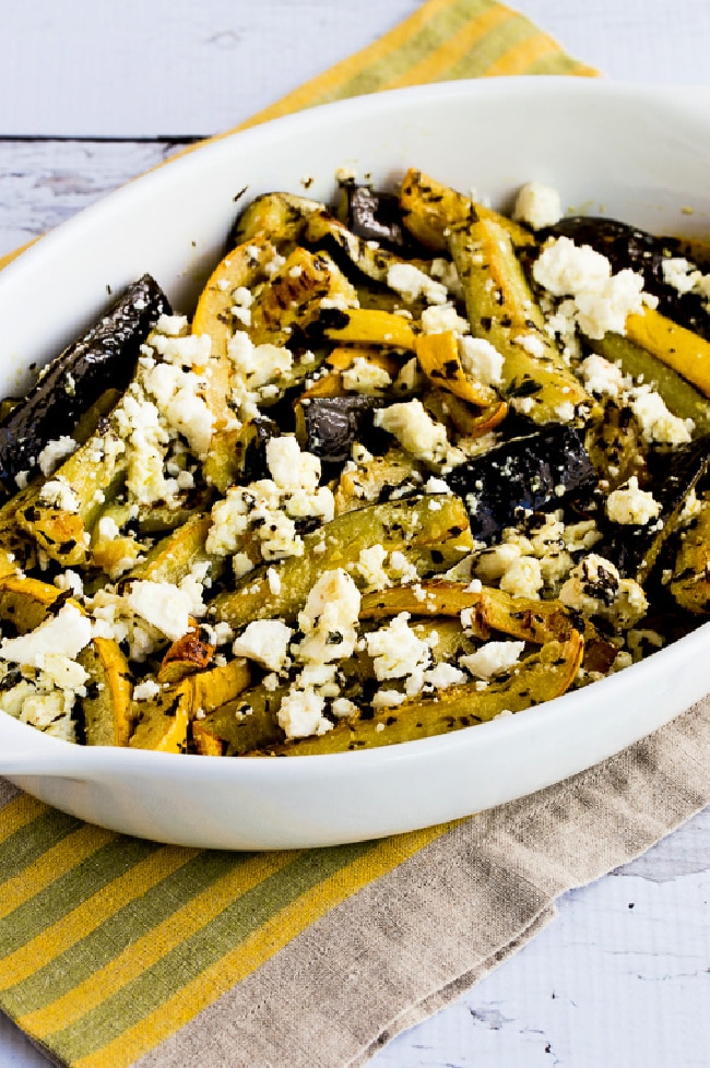 Roasted summer squash with lemon, mint, and feta finished in a baking dish