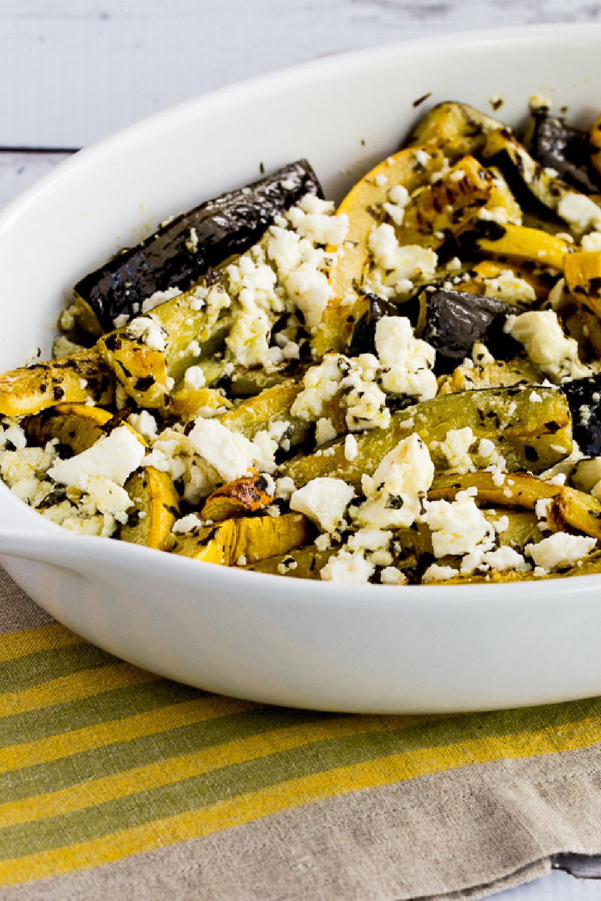 Baked Summer Squash with Lemon, Mint, and Feta in serving dish