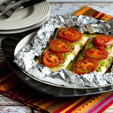 Baked Salmon with Pesto and Tomatoes finished dish on serving plate
