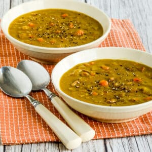 Square image of Slow Cooker Split Pea Soup shown in two bowls.