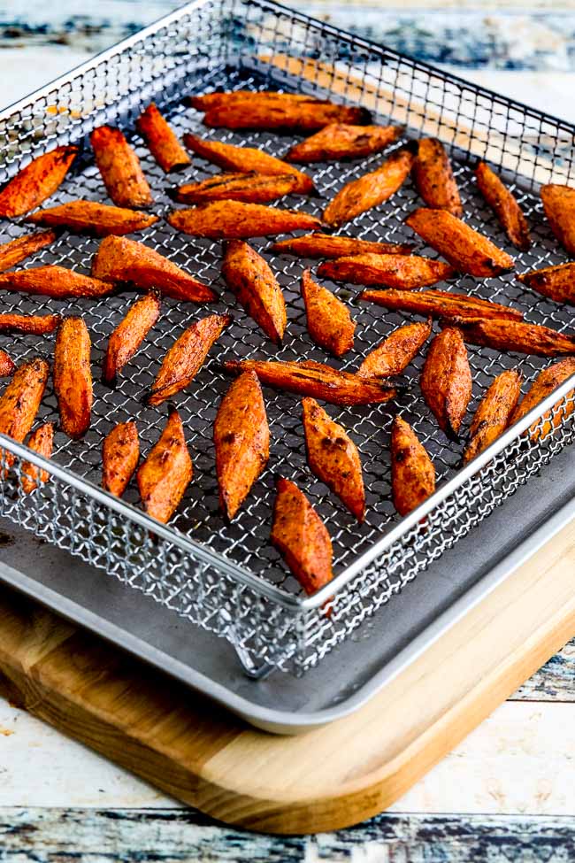 Air Fryer Carrots with Moroccan Spice shown in Air Fryer basket.