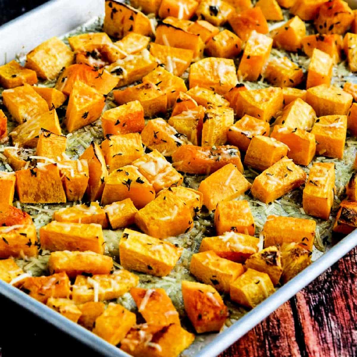 Square image for Roasted Butternut Squash with Lemon, Thyme, and Parmesan shown in baking sheet.