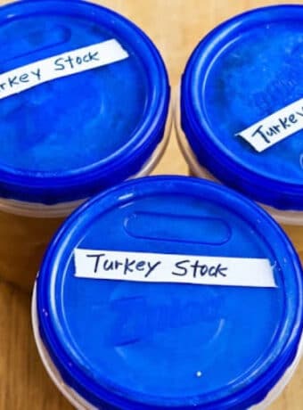 How to Make Turkey Stock showing stock in freezer containers