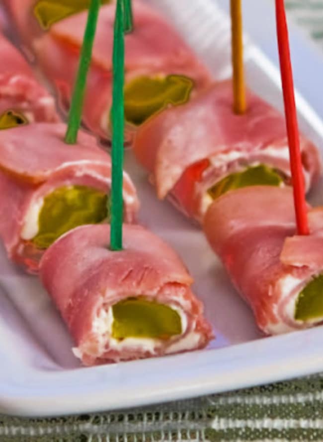 Ham and Pickle Roll Ups, close-up photo on serving plate with toothpicks