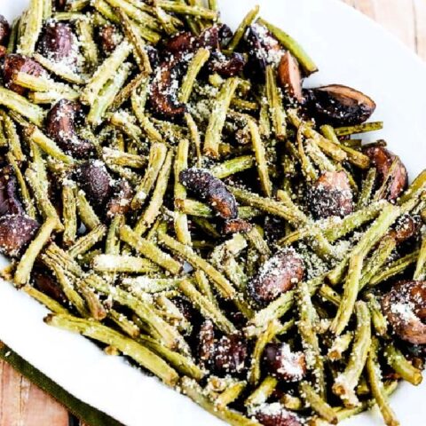 Roasted Green Beans with Mushrooms, Balsamic, and Parmesan close-up image of finished beans on serving plate