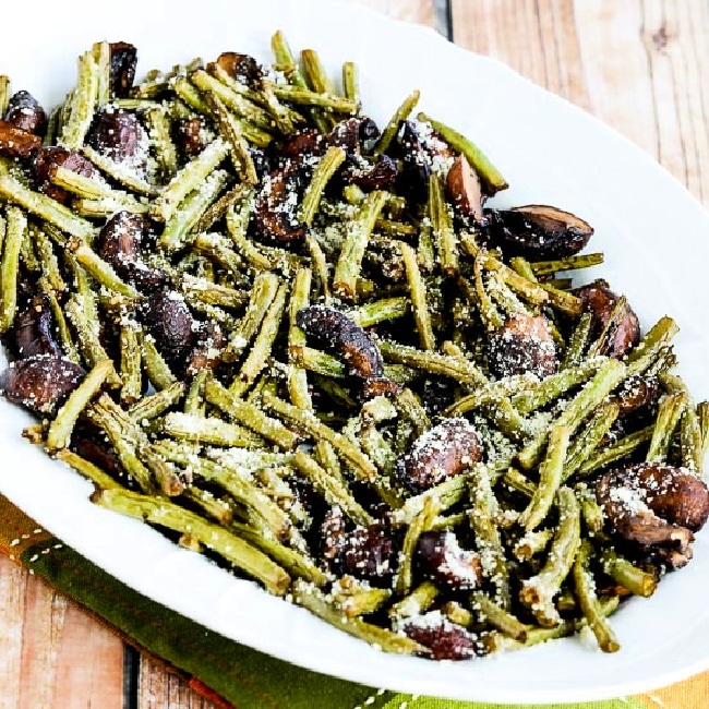 Roasted Green Beans with Mushrooms, Balsamic, and Parmesan Picture a large square of ready-made beans on the plate