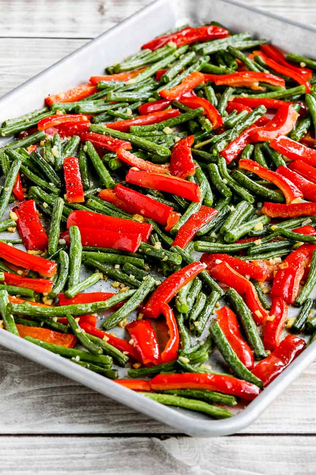 Roasted Green Beans and Red Bell Pepper cooked dish on baking sheet