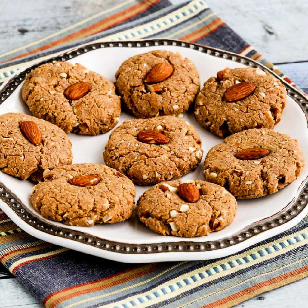 Square image for Sugar-Free Gluten-Free Almond Cookies shown on serving plate.