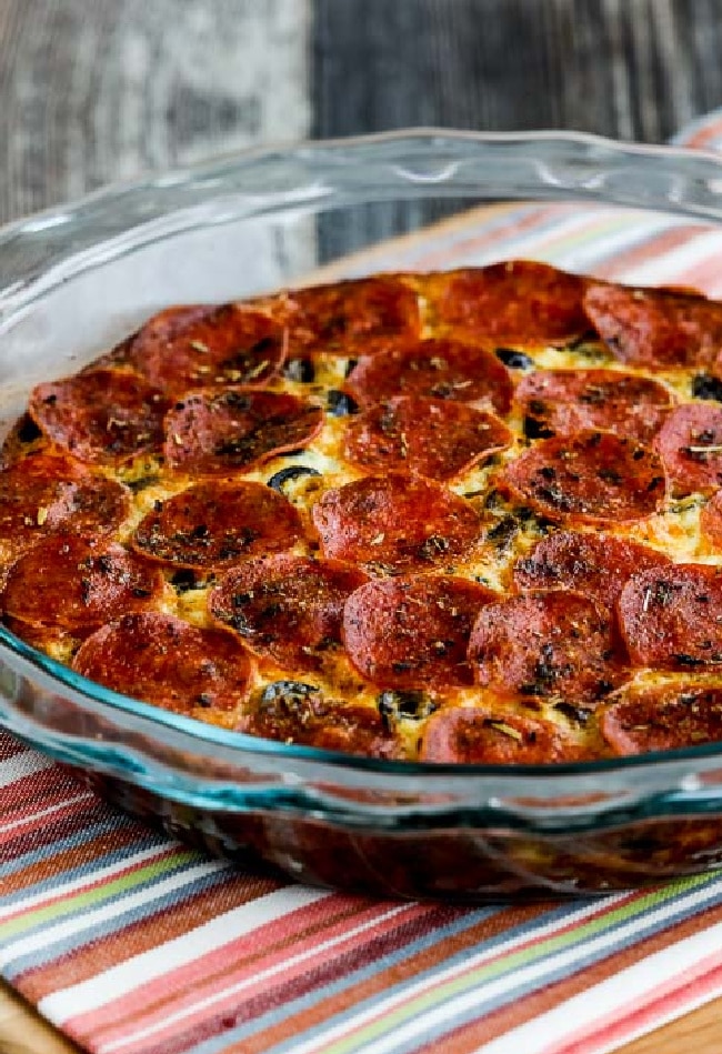 Cropped photo of pepperoni pizza ketocrust squish in a baking dish