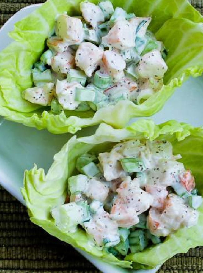 Shrimp Salad Wraps with shrimp salad in side cabbage on serving plate