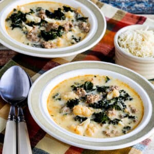 square image of Instant Pot Zuppa Toscana Soup shown in two bowls with Parmesan