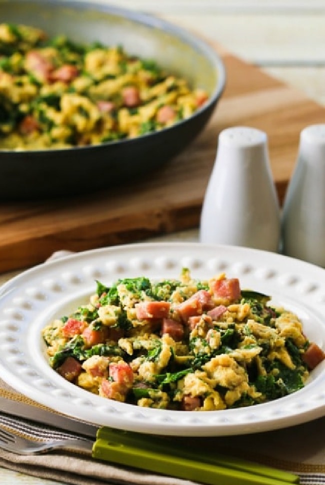 Cropped image of Green Eggs and Ham on serving plate and in skilet