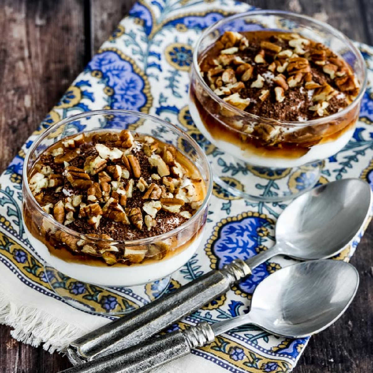 10 Minute Greek Yogurt Dessert in dessert glasses on colorful napkin