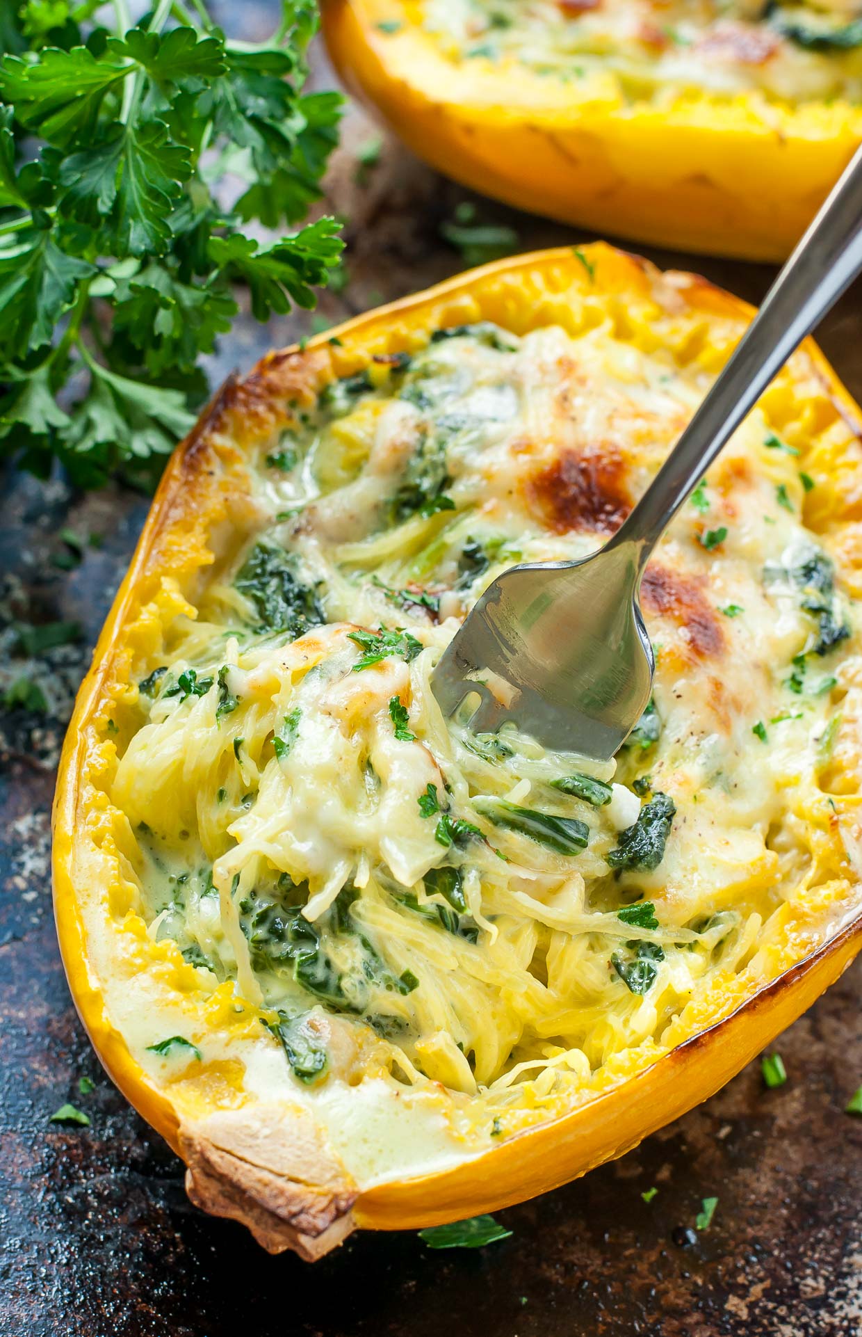 Cheesy Garlic and Parmesan Spinach Spaghetti Squash from Peas and Crayons