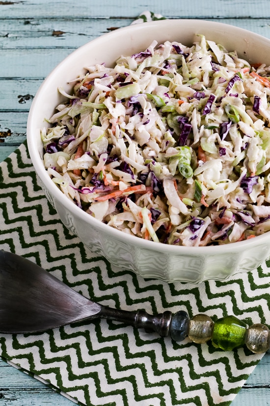 Kalyn's Low-Carb Coleslaw shown in serving bowl with fork