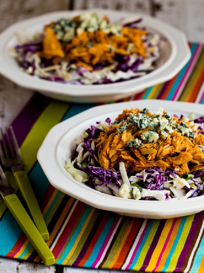 Buffalo Chicken and Blue Cheese Cabbage Bowl close-up image of two cabbage bowls on napkin