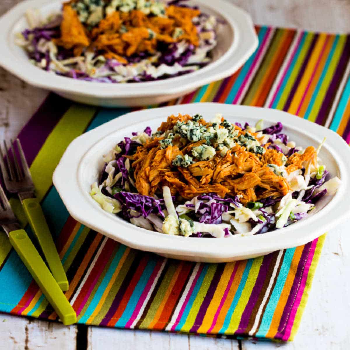 square image of 2 Buffalo Chicken Bowls on colorful napkin