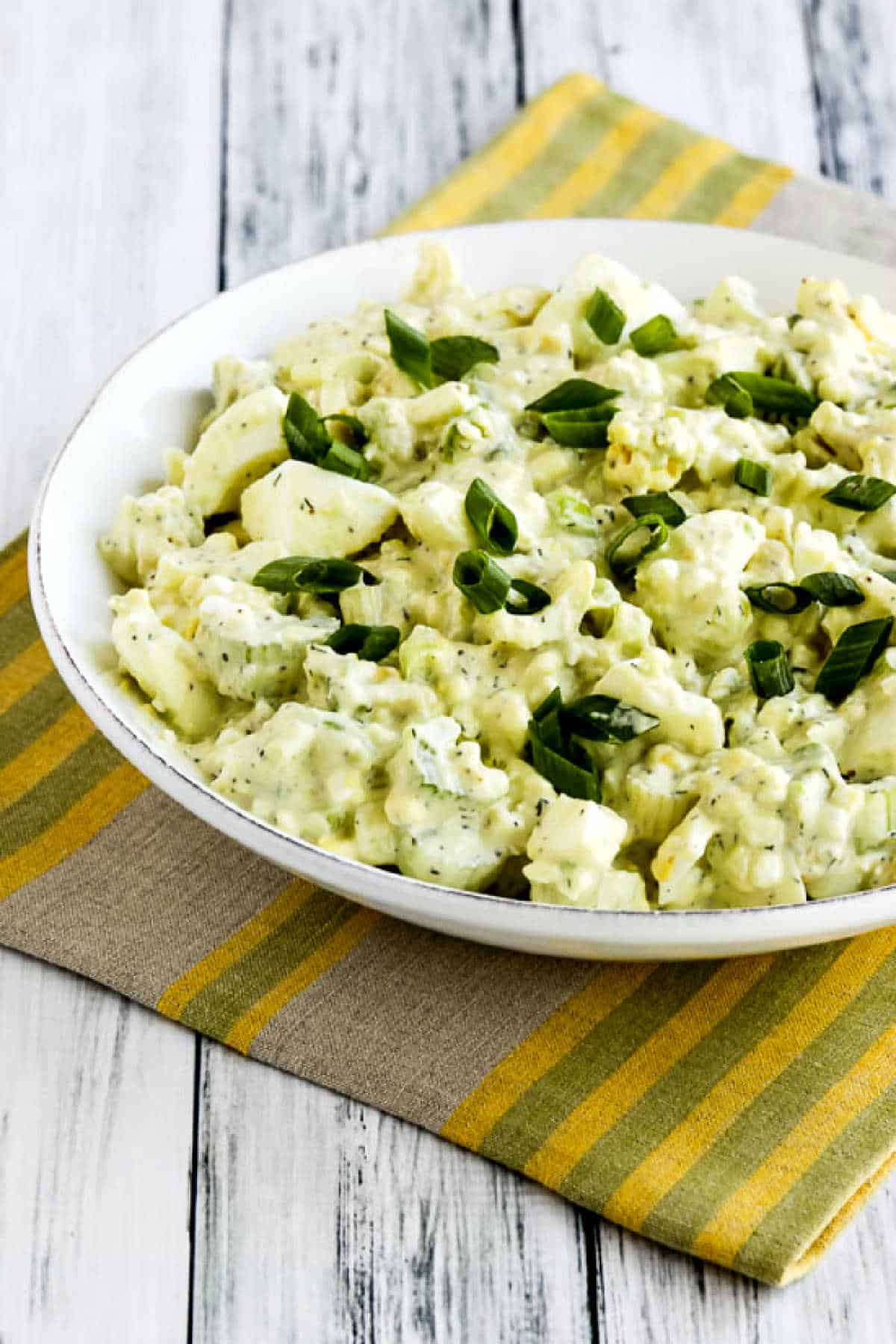 farther away shot of Avocado Egg Salad in serving dish
