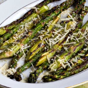 close-up photo of Grilled Asparagus with Parmesan on serving plate