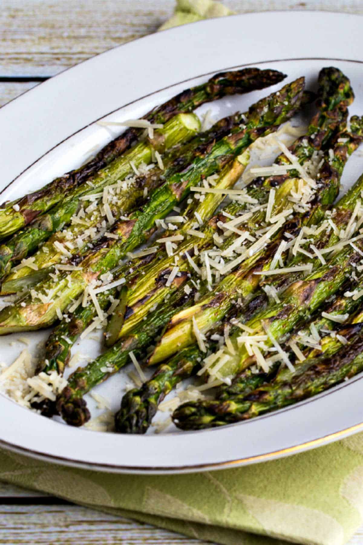 Grilled Asparagus with Parmesan shown on large serving platter.