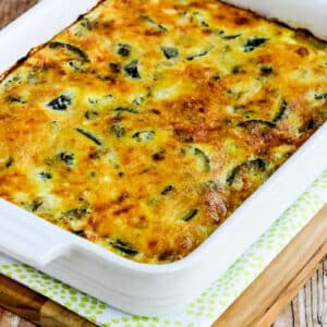 Cheesy Zucchini and Basil Strata shown in baking dish.